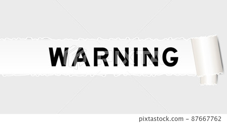 Ripped gray paper background that have word warning under torn part Ripped gray paper background that have word warning under torn part 87667762