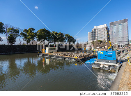Tokyo cityscape in Japan Construction work is underway to repair damaged masonry in Babasaki Moat 87668215