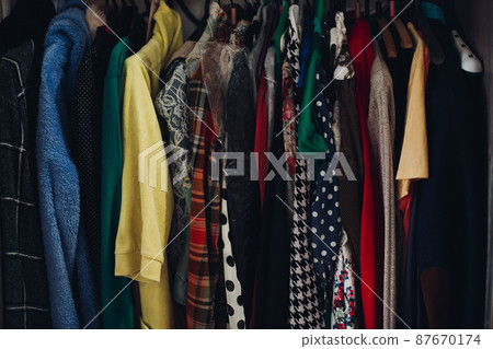 Rack of different clothing in wardrobe in Rack of different clothing in wardrobe in 87670174