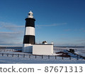 Lighthouse at Cape Notori in winter 87671313
