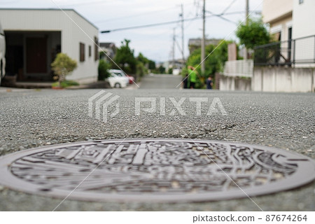 Through the manhole 87674264