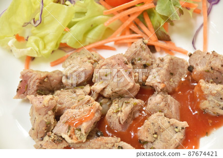 grilled slice beef ribeye steak dressing spicy barbecue sauce with salad on plate grilled slice beef ribeye steak dressing spicy barbecue sauce with salad on plate 87674421