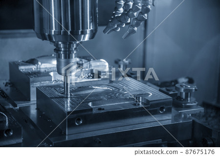 The CNC milling machine rough cutting the injection mold parts by indexable  endmill tools. 87675176