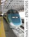 Shinkansen on a snowy day 87675805