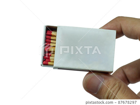 someone hold the red matchbox opened isolated on white background. Side view and Blank space 87678297