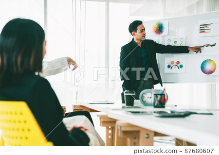 Business people proficiently discuss work project while sitting in circle Business people proficiently discuss work project while sitting in circle 87680607