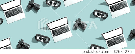 Tech gear theme with vr headset, dslr camera and laptop Tech gear theme with vr headset, dslr camera and laptop 87681276