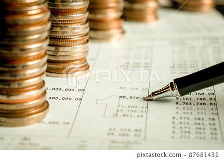 Pile of gold coins money stack in finance treasury deposit bank account saving 87681431