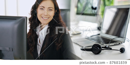 Business people wearing headset working in office broaden view Business people wearing headset working in office broaden view 87681839