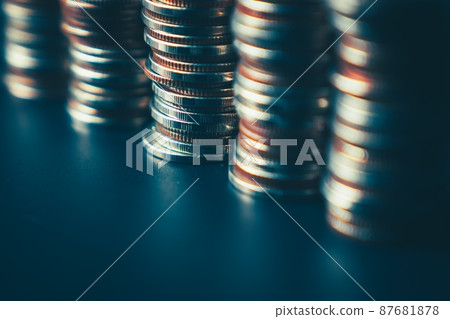 Pile of gold coins money stack in finance treasury deposit bank account saving 87681878