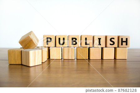 Publish symbol. The concept word Publish on wooden cubes. Beautiful wooden table, white background, copy space. Business publish and publishing concept. Publish symbol. The concept word Publish on wooden cubes. Beautiful wooden table, white background, copy space. Business publish and publishing concept. 87682128