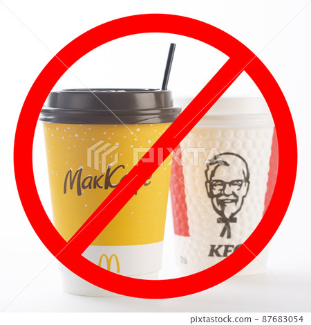 St. Petersburg, Russia - March 13, 2022: Paper cup from McDonald's and KFC crossed out on a white background. McDonald's and KFC is leaving Russia. The inscription on the cup McCafe. isolated St. Petersburg, Russia - March 13, 2022: Paper cup from McDonald's and KFC crossed out on a white background. McDonald's and KFC is leaving Russia. The inscription on the cup McCafe. isolated 87683054