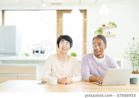 Senior couple PC living room Senior couple PC living room 87686958