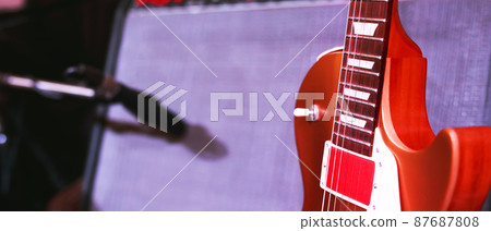 Electric guitar. Musical instrument with on stage in Concert. 87687808