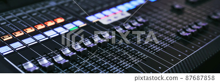 Recording Studio Mixing Desk with Music Producer on the concert stage 87687858