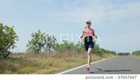 asian woman jogging athlete 87687887