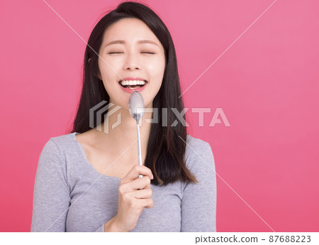 Happy  hungry lady hold metal spoon desire dinner  87688223