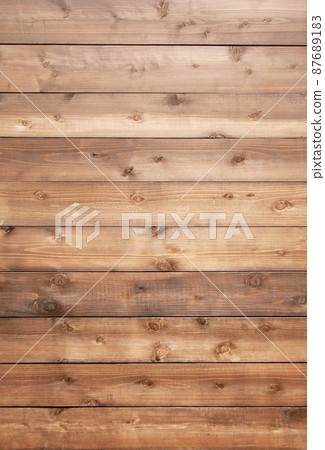 Vertical background image with reddish brown boards with wood grain and knots 87689183
