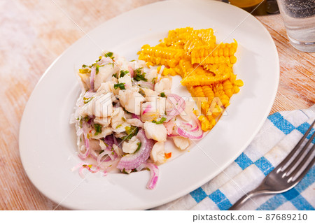 Ceviche of trout served with onion, parsley and corn Ceviche of trout served with onion, parsley and corn 87689210
