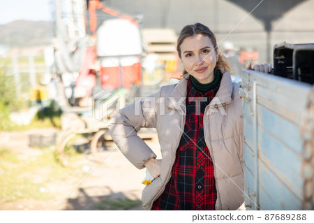 Portrait of worker standing outdoors 87689288
