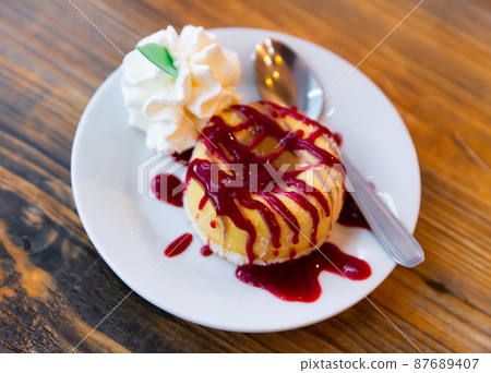 Dessert with sorbet, donut and syrup Dessert with sorbet, donut and syrup 87689407