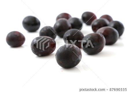 Japanese luxury grape grains, lighting, white background. Japanese luxury grape grains, lighting, white background. 87690335
