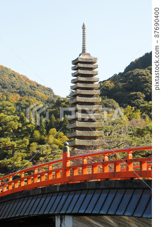 Scenery of Uji: Red-painted bridge and 13-storied stone pagoda, Uji City, Kyoto Prefecture 87690400