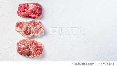 A set of different types of raw beef steaks A set of different types of raw beef steaks 87693423