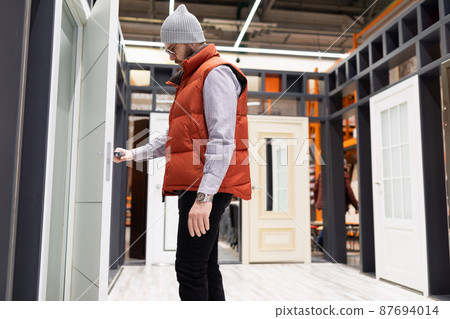 hardware store customer chooses interior doors hardware store customer chooses interior doors 87694014