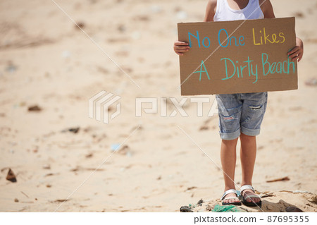 Girl Asking to Clean Beach 87695355