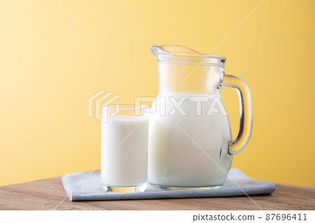 Milk on the table 87696411