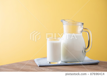 Milk on the table 87696414