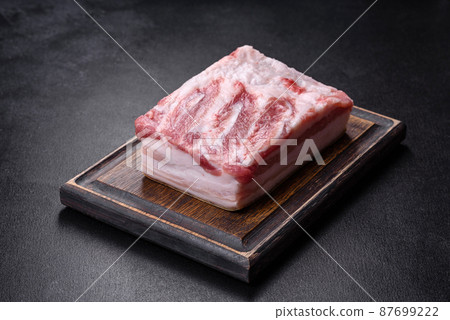 Close-up fat Salted lard homemade lard on a wooden board Close-up fat Salted lard homemade lard on a wooden board 87699222