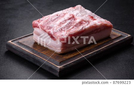 Close-up fat Salted lard homemade lard on a wooden board Close-up fat Salted lard homemade lard on a wooden board 87699223
