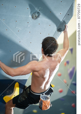 Back view of sportive man training Back view of sportive man training 87700729