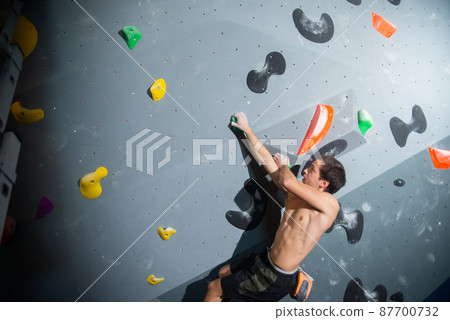 Cropped image of sportive man training Cropped image of sportive man training 87700732