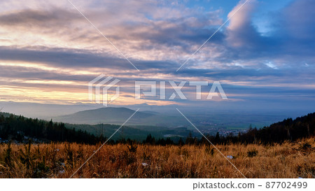 Sunset dramatic sky over mountains shape 87702499