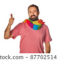Happy bearded man in stylish white T-shirt with beaming smile showing thumb up. isolated on white background. lgtbq scarf gay concept. good job, well done. agreement concept 87702514