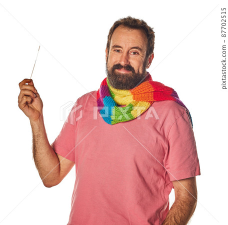 Portrait adul man, showing a auto test for COVID-19 with Antigen kit, for possible infection of Coronavirus. Medicine and health-related services online. 87702515