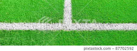 Green grass on sport field with white line Green grass on sport field with white line 87702592