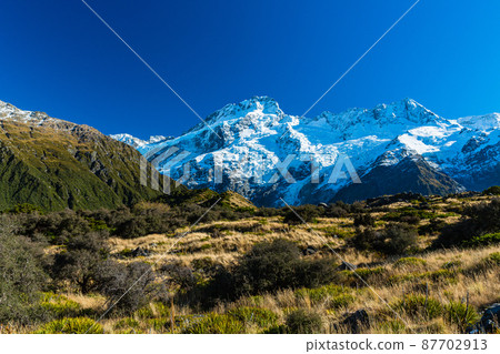 Mount Sefton seen from the Hooker Valley Track in Aoraki Mount Cook National Park, New Zealand Mount Sefton seen from the Hooker Valley Track in Aoraki Mount Cook National Park, New Zealand 87702913