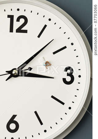 miniature man sleepless on the clock miniature man sleepless on the clock 87703066