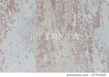 Peeling whitewash on a plaster wall Peeling whitewash on a plaster wall 87703605