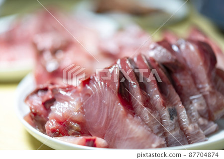Delicious yellowtail hot pot dish Delicious yellowtail hot pot dish 87704874