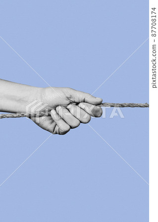 man pulls a rope in black and white man pulls a rope in black and white 87708174