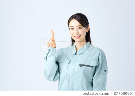 Young business woman in work clothes Young business woman in work clothes 87709090