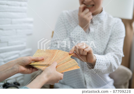Psychologist uses metaphorical associative cards in a session with a patient. Psychologist uses metaphorical associative cards in a session with a patient. 87709228