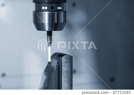 Closeup scene the CMM probe measuring the mold part on the CNC milling machine. Closeup scene the CMM probe measuring the mold part on the CNC milling machine. 87711085