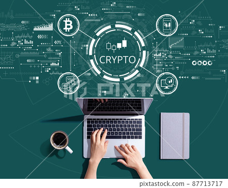 Crypto Trading theme with person using a laptop Crypto Trading theme with person using a laptop 87713717