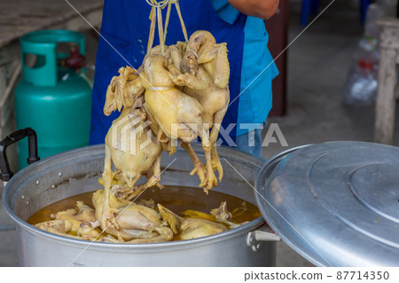boiled chicken. boiled chicken over pot broth. boiled chicken for food ingredient boiled chicken. boiled chicken over pot broth. boiled chicken for food ingredient 87714350